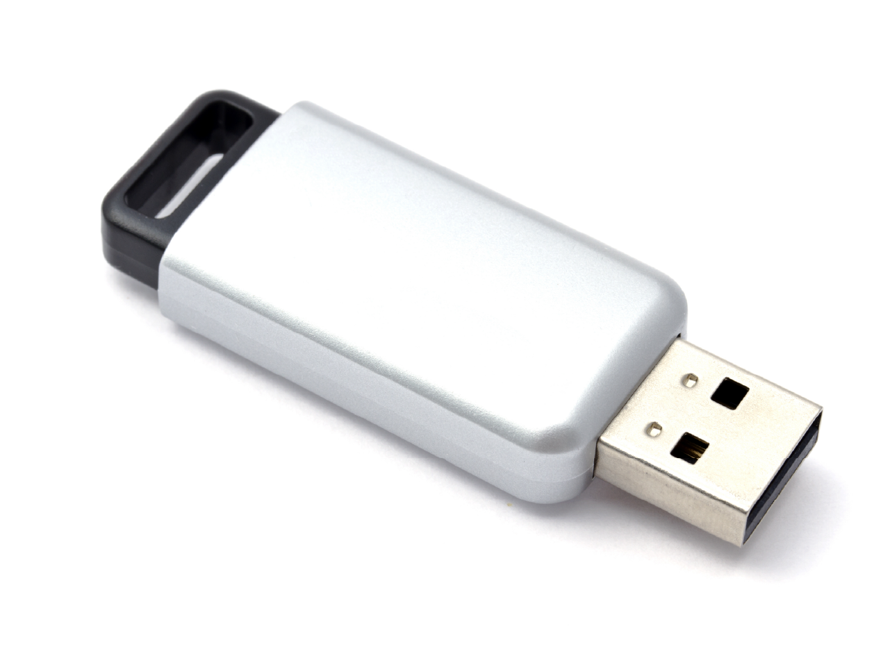 A silver USB flash drive.